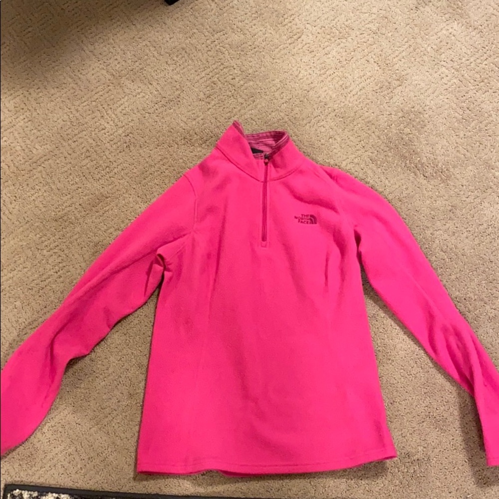 I am selling a hot pink north face quarter zip up.